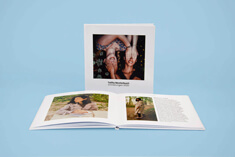 High-quality photo book, lay-flat hardcover, square format